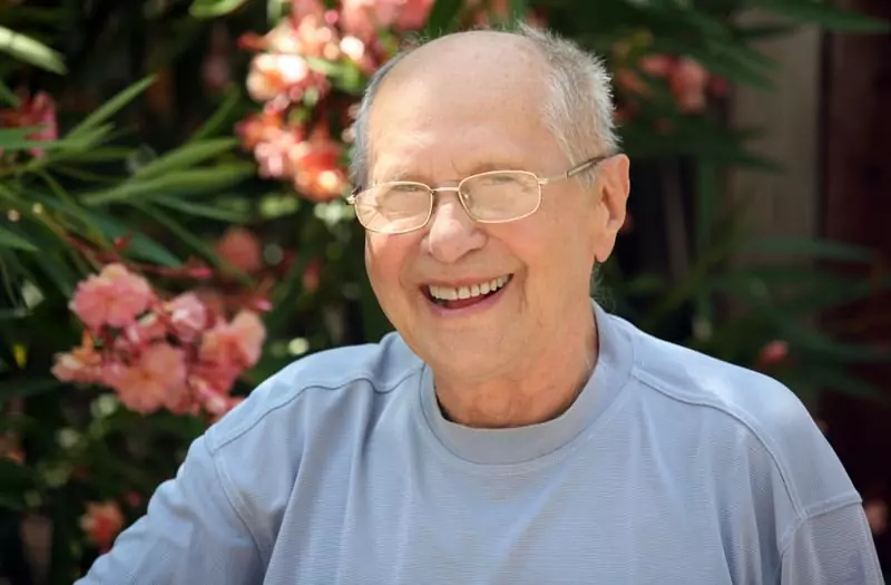 Breathe brought relief to Christian G., a laughing elderly man in a blue shirt.